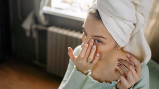 A Woman Applying Under Eye Masks