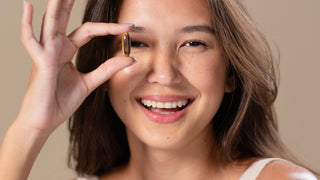 Portrait of Woman with Capsule Supplement