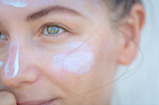 Closeup Portrait of a Woman with Cream on a Face