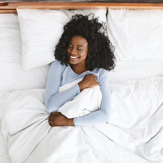 woman relaxing in bed