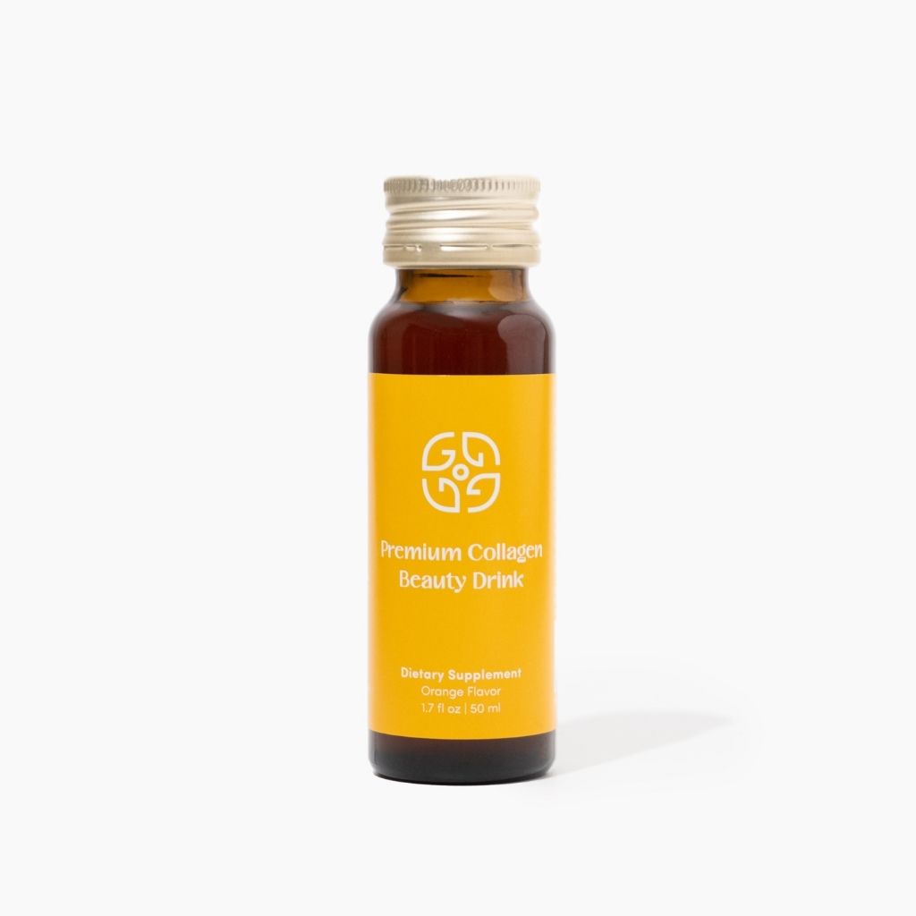 Bottle of premium collagen beauty drink with orange flavor.